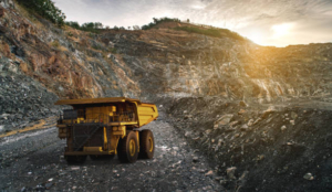 A large dump truck in a gold mine