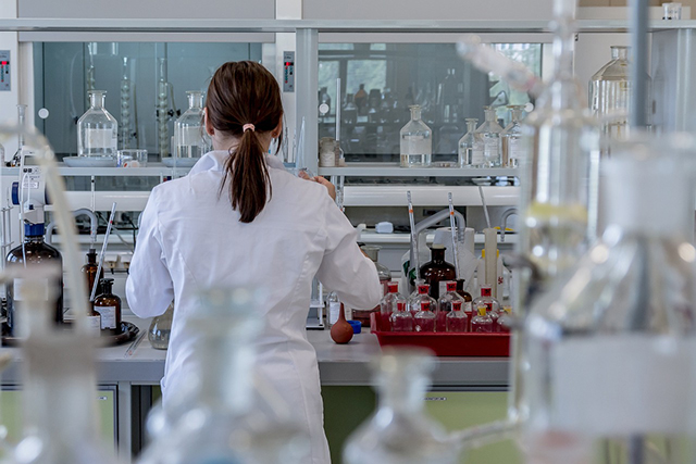 a woman doing laboratory analysis