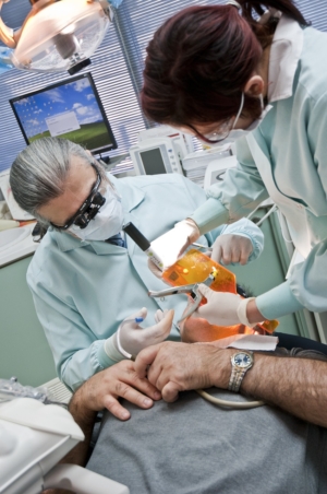 a dentists working on patient